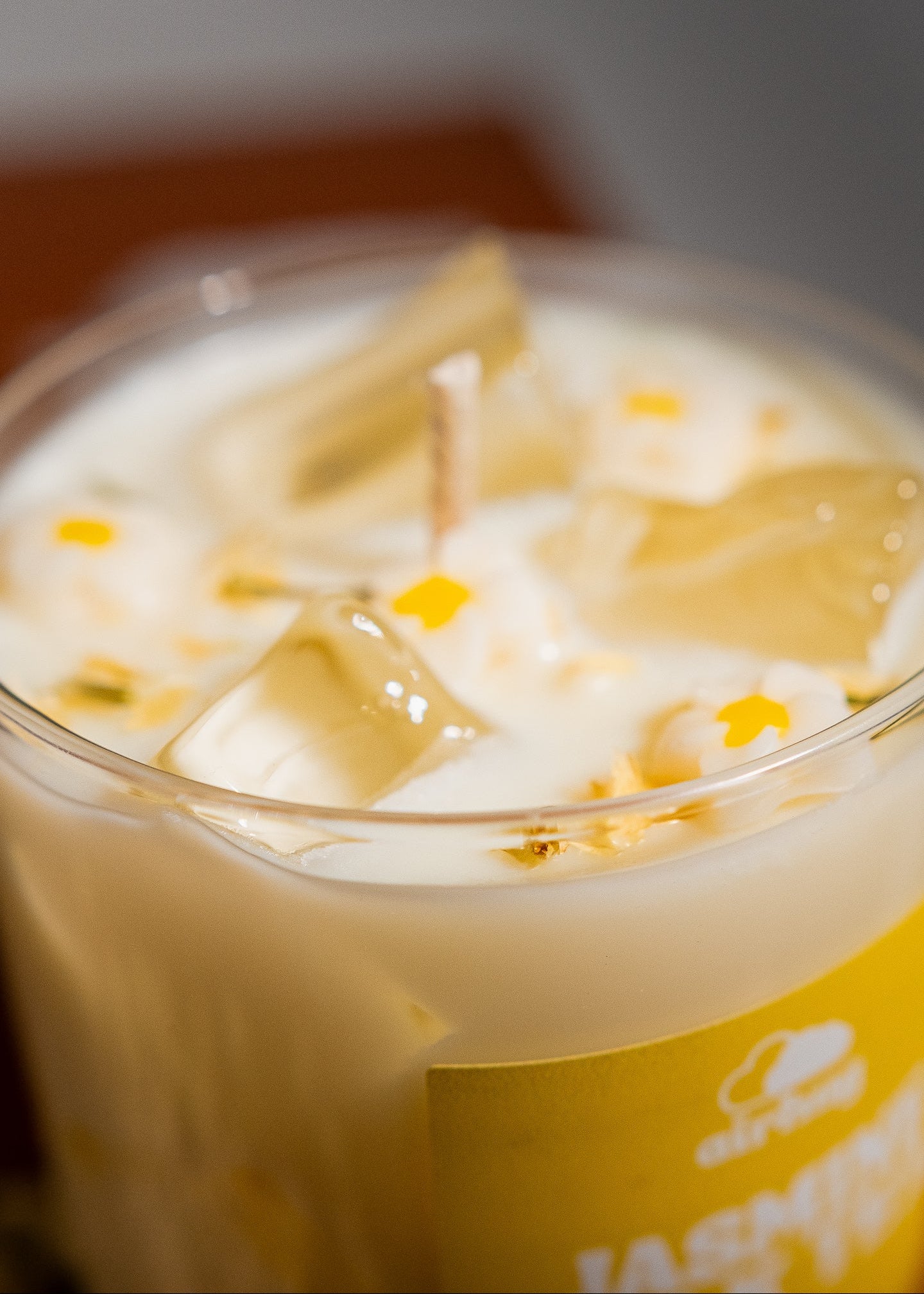 Close-up of a jasmine milk tea dessert candle with blurred background